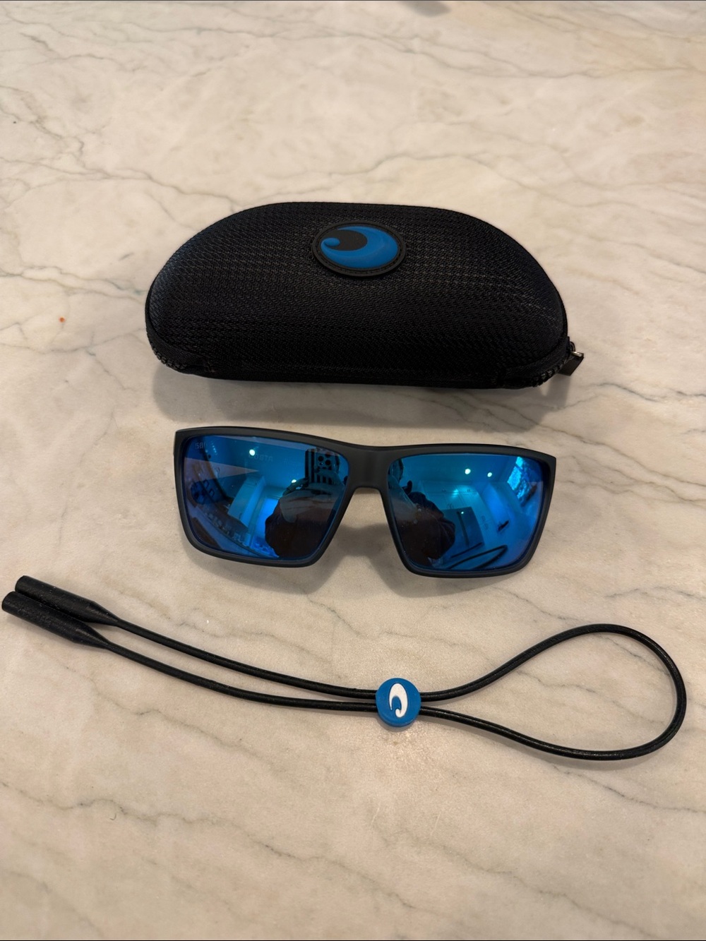 Costa Rincon Matte Black Sunglasses with Blue Mirror Lenses case and strap